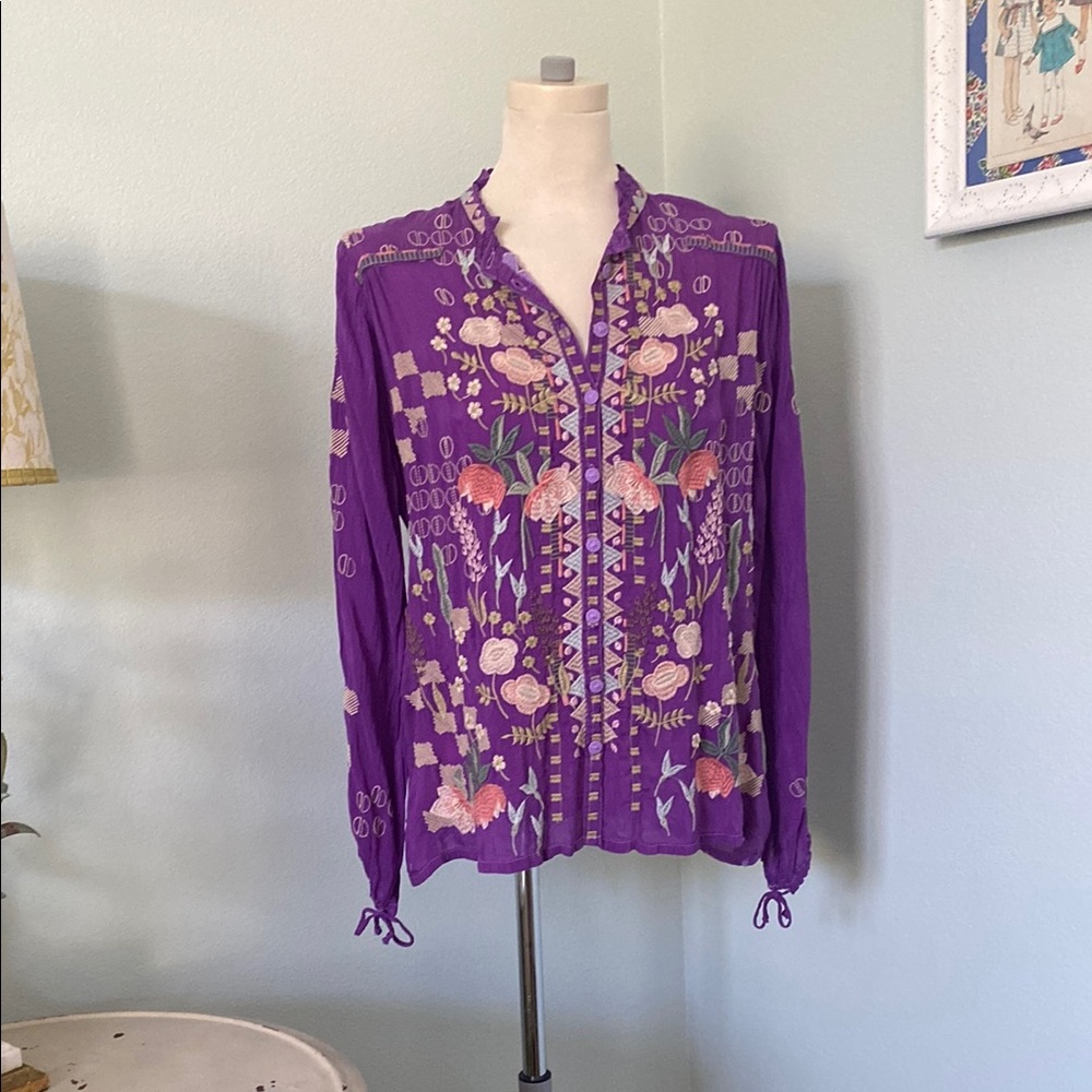Johnny was NWT Embroidered purple top.